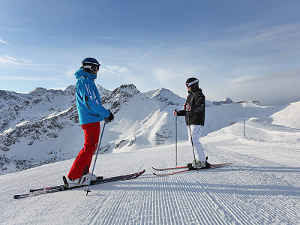 Two friends go skiing