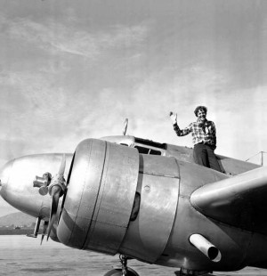 Amelia atop her brand-new Lockheed Electra L-10 upon delivery from the factory.